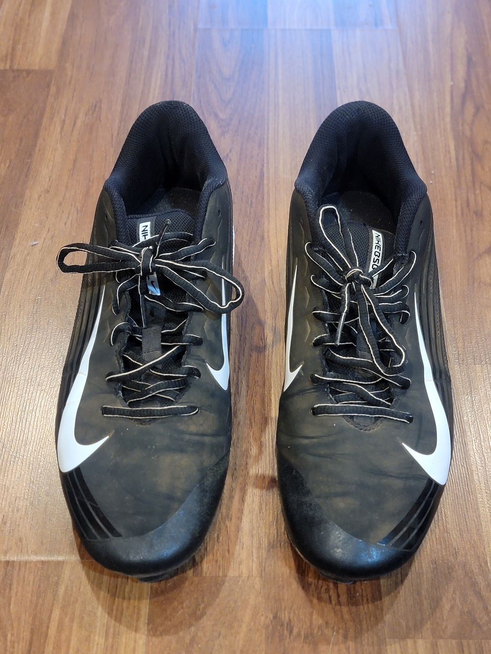 Nike Men’s Black Baseball Cleats with White Swoosh